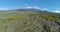 Aerial view of Sicily mountain. Drone aerial of arid land near Etna volcano.