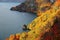 Aerial view of a sightseeing boat on autumn Lake Towada, in Towada Hachimantai National Park, Aomori, Japan