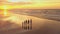 Aerial view of silhouettes of happy family walking and holding the hands each other on beach during sunset