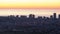 Aerial view of the Silhouettes of Skyscrapers against the Sunset in the Big City