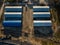 Aerial view of the six round cylindrical storage hangars on a br