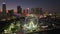 Aerial view of Skyviews Miami Observation Wheel at Bayside Marketplace with high illuminated skyscrapers of Brickell