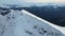 Aerial view of the slope of the Rosa Khutor ski resort and Black Pyramid peak