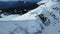 Aerial view of the slope of the Rosa Khutor ski resort and Black Pyramid peak