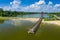 Aerial view of a smal wooden dock on a lake