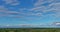 Aerial view of small American Inman town under a bright blue sky clouds