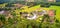 Aerial view of a small development area on the edge of a village