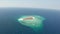 Aerial view of small exotic island during sunny summer day