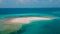 Aerial view of the small isolated amazing beautiful tropical island with beach in lagoon at the middle of indian ocean