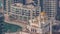 Aerial view of the small mosque of Dubai Marina at morning timelapse