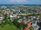 Aerial view on a small polish city with trees and fields