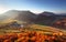 Aerial view on small town - colorful fields and trees in autumn, Slovakia - Povazie