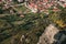 Aerial view of a small town nestled in the foothills of a mountainous region. Kalabaka, Greece.