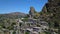 Aerial view of the Small village of Pentedattilo, church and ruins of the abandoned village, Greek colony on Mount Calvario, whose