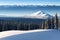 Aerial view of snow capped mountain scene