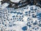 Aerial view of snow covered roofs over the traditional chalets