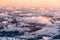 Aerial view of snowy landscape in winter with mountains and lakes in Norway at sunset