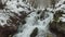 Aerial view of snowy river in forest