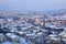 Aerial view on snowy town. Alba, Italy.