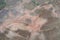 Aerial view of soil fertile ground surface. Close up of natural pattern texture background. Top view of organic dirt in garden