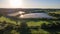 Aerial view of the solar panel in solar farm in evening sun light