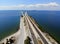 The aerial view of the south entrance to the fishing pier near Bob Graham Sunshine Skyway Bridge at St Petersburg, Florida, U.S.A