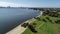 Aerial view of South Perth Western Australia along banks of Swan River showing parkland, beach and cycleway