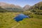 Aerial view of spectacular alpine scenery with Lochs and mountains Glen Etive, Glencoe, Scotland