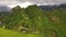 Aerial view of spectacular landscape, hills covered with lush greenery.