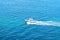 Aerial view of speed motorboat on open Mediterranean sea.