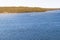 Aerial view of speeding boat in sea. Speed boat at sea. View from above. Speedboat floating in a turquoise blue sea water. Motorbo