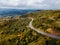 aerial view of speedway road in autumn carpathian mountains