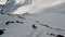 Aerial view sportsman riding ski freeride downhill on mountain slope extreme sport leisure activity