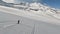 Aerial view sportsman riding ski on mountain slope field extreme sport leisure activity