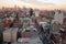 Aerial view of sprawling golden hour NYC urban landscape skyscrapers