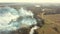 Aerial View. Spring Dry Grass Burns During Drought Hot Weather. Bush Fire And Smoke. Fire Engine, Fire Truck On