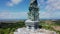 Aerial view statue hindu god garuda wisnu kencana Statue, Bali. The sightseeing Helicopter flies past the GWK statue