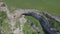 Aerial view of the steep walls of the stone plateau