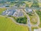 Aerial view of storage and freight terminal with trucks and containers. Industrial background. Logistic center