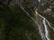 Aerial view of Stormy flow of mountain river Dolra. Summer vacation and yravel concept, hiking in Mazeri, Svaneti Georgia