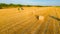 Aerial view of straw bale on farm field