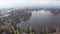 Aerial view of Strbske Pleso, Slovakia. Mountain Lake in Clouds and Snowy Tatras Mountains