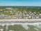 Aerial view of stunning view of beachfront condos situated along an oceanfront in Surfside Beach