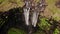 Aerial view of stunning waterfall in Faroe Islands. Aerial view of Fossa waterfall. Cloudy weather,establishing shot, no