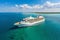 Aerial view of stunning white cruise ship on a sunny day, luxury