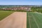 Aerial view of a suburb on the outskirts of Wolfsburg in Germany, with terraced houses, semi-detached houses and detached houses,