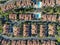 Aerial view suburban neighborhood with identical villas next to each other in the valley. San Diego, California,