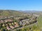 Aerial view suburban neighborhood with identical villas next to each other in the valley. San Diego, California,