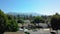 Aerial view of a suburban neighborhood whit mountain. move drone panoram. California. fly to up
