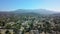 Aerial view of a suburban neighborhood whit mountain. move drone panoram. California. Slow fly